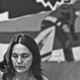 An image of Dolores Huerta looking downward and solemn.