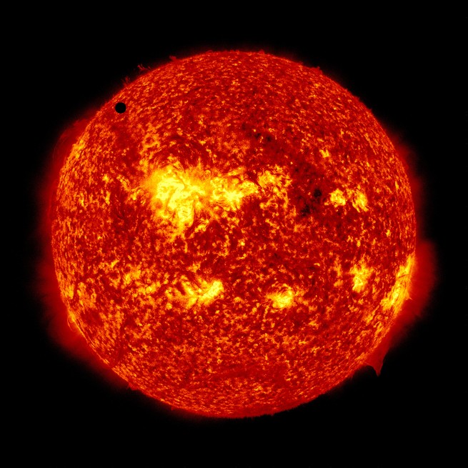 A view of the sun that makes our star vaguely resemble a slice of pepperoni