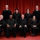 The U.S. Supreme Court justices pose for their group portrait on November 30, 2018.