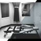 A black and white static-y image of an execution chamber