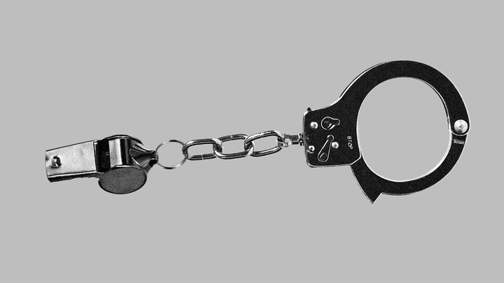 Whistle chained to a handcuff