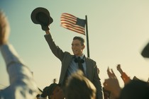 Oppenheimer raising up his hat