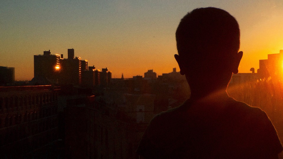 A child staring at the horizon