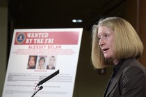 Acting Assistant Attorney General Mary McCord announces charges against four Russians in connection to an enormous data breach at Yahoo.