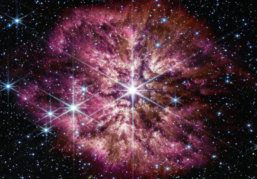 A view of turbulent gas and dust surrounding a distant star.