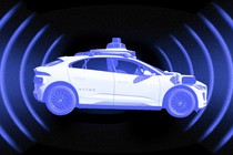 Photo-illustration of a Waymo car