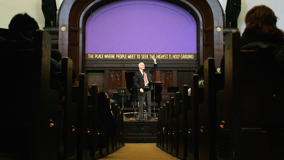 Photo of Tim Keller preaching
