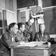 William "Wild Bill" Donovan (standing) in 1945