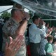 General Norman Schwarzkopf and President George H.W. Bush salute troops at the victory parade in Washington on June 8, 1991.