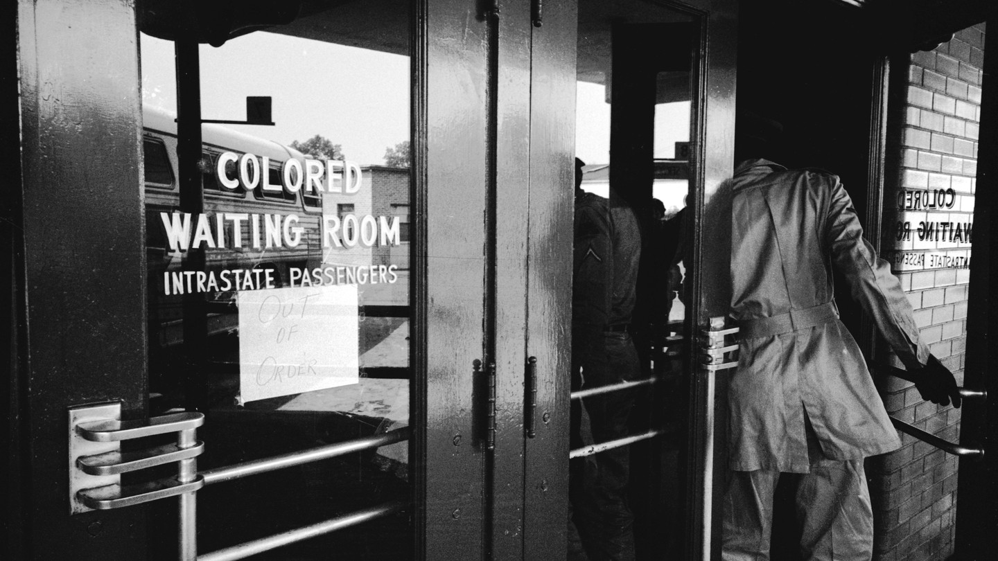 photo of door with "Colored Waiting Room"