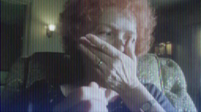 screen shot from a video montage of awkward pill-taking in movies