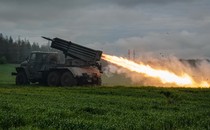 A rocket is launched from a truck-mounted multiple rocket launcher.