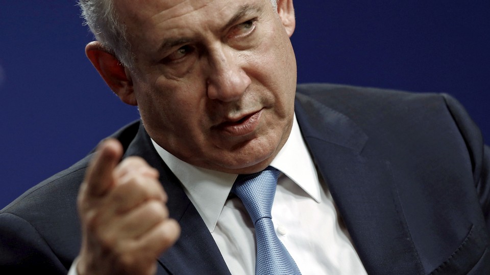 Prime Minister Benjamin Netanyahu  waves a finger menacingly.