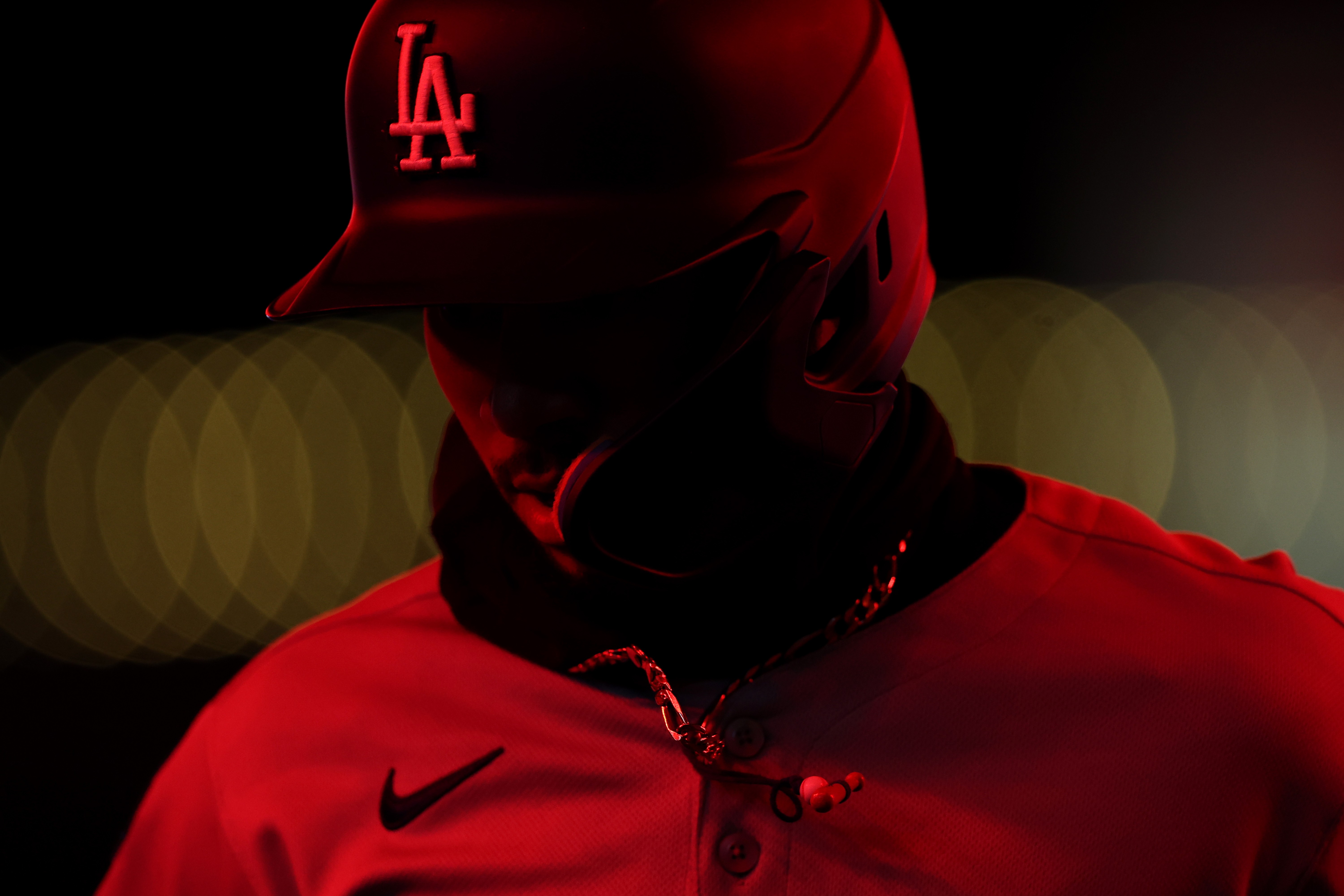 A close view of a baseball player wearing a batting helmet