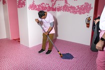 Museum of Ice Cream employee mopping the floor