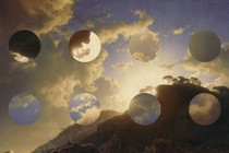 A photo of the sky with eight decorative holes in it