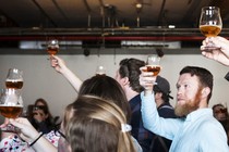 Visitors taste beer at Brooklyn Brewery, in New York