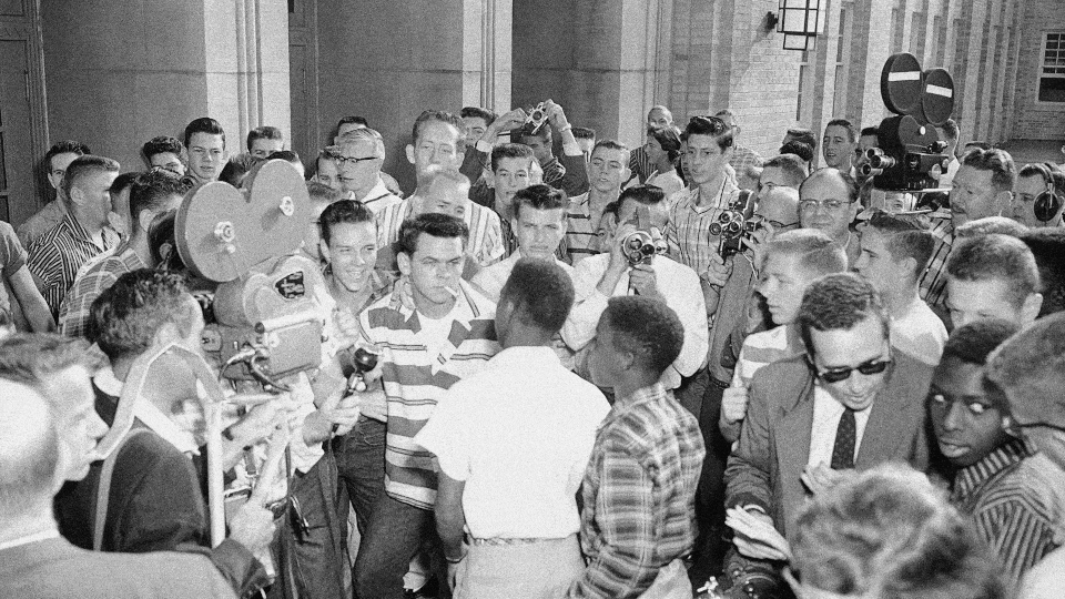 White students in front of North Little Rock High School trying to block Black students from entering in 1957. Jerry Jones is circled.