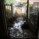 A flooded and muddy entryway in a house in North Carolina