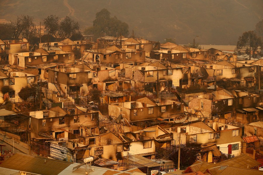 A cluster of burned-out houses