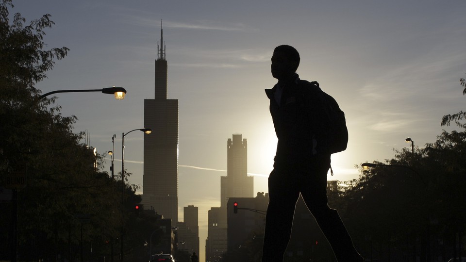 A student walks to high school in Chicago.