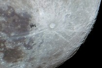 An image of the Moon and the International Space Station