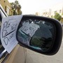A note reading 'Plz do not drive' is placed by an unknown person on female driver Azza Al Shmasani's car
