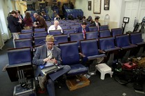 Glenn Thrush works in the White House briefing room