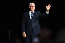 A photo of Mike Pence waving