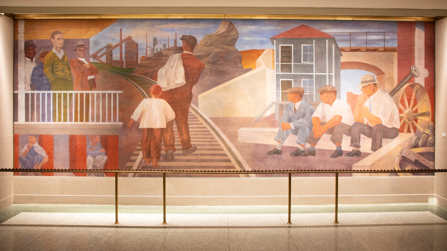photo of wall mural painting with men standing on balcony, man and child walking up railroad tracks, and 3 men sitting at idled factory