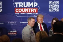 Donald Trump greets guests at the 2023 Lincoln Dinner on July 28.