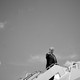 Donald Trump holds up a fist before boarding a plane