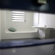 A jail cell in an enhanced supervision housing unit on Rikers Island, seen through a slot in the door