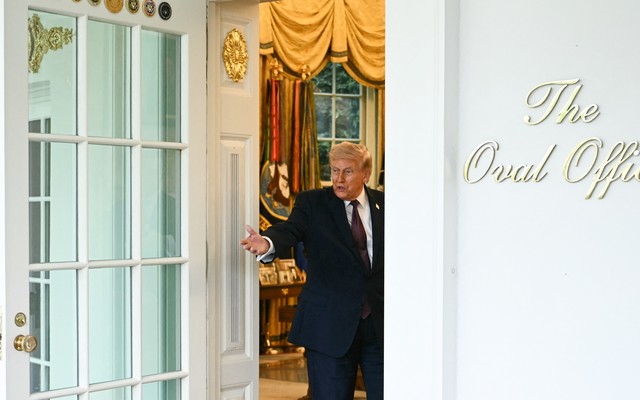Donald Trump entering the Oval Office