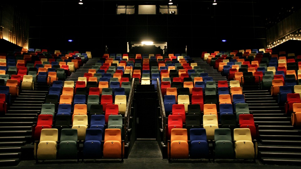 A colorful array of seats in a movie theater