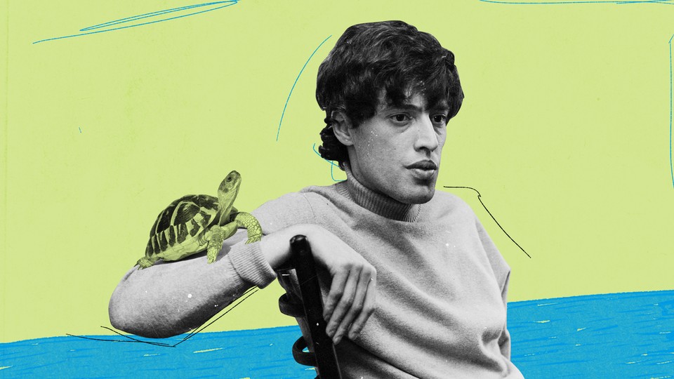 Tom Stoppard with a turtle on his arm