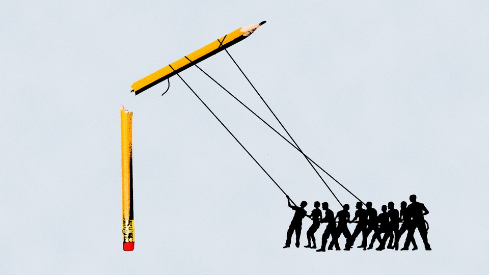 protesters cracking a pencil