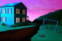 A house and a front yard, with a gigantic crack between them