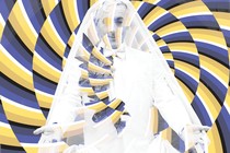 illustration of Alan Cumming surrounded by kaleidoscopic colors