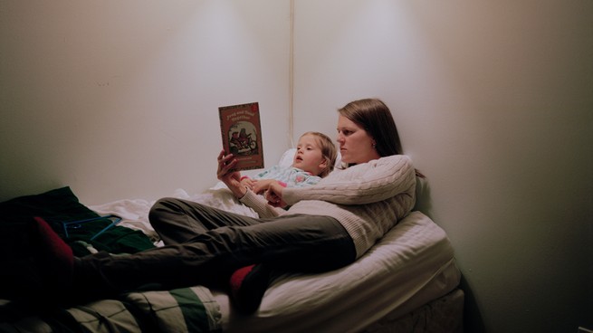 A parent and child reading