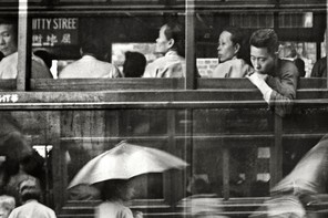 Black-and-white image of a Hong Kong street in the mid-20th century, taken by the Shanghainese photographer Fan Ho