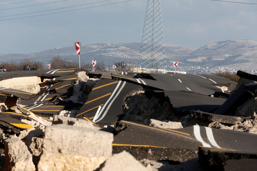 A section of highway seen broken into large chunks of rubble by an earthquake