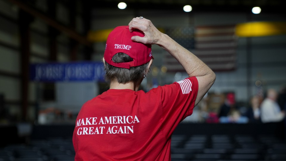 person with MAGA tshirt and hat