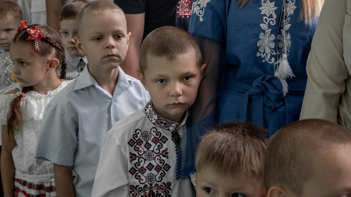 Young students return to school in the village of Savyntsi.
