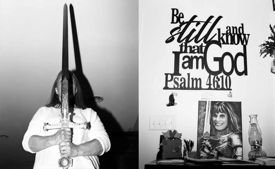 A woman holding a sword next to a wall with Psalm 46:10 written on it along with trinkets on a table