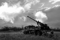 A Ukrainian artillery battery fires at Russian lines.