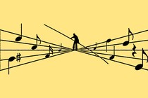 Man balancing on a set of notes