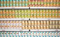 Cans of fruit salad at a grocery store