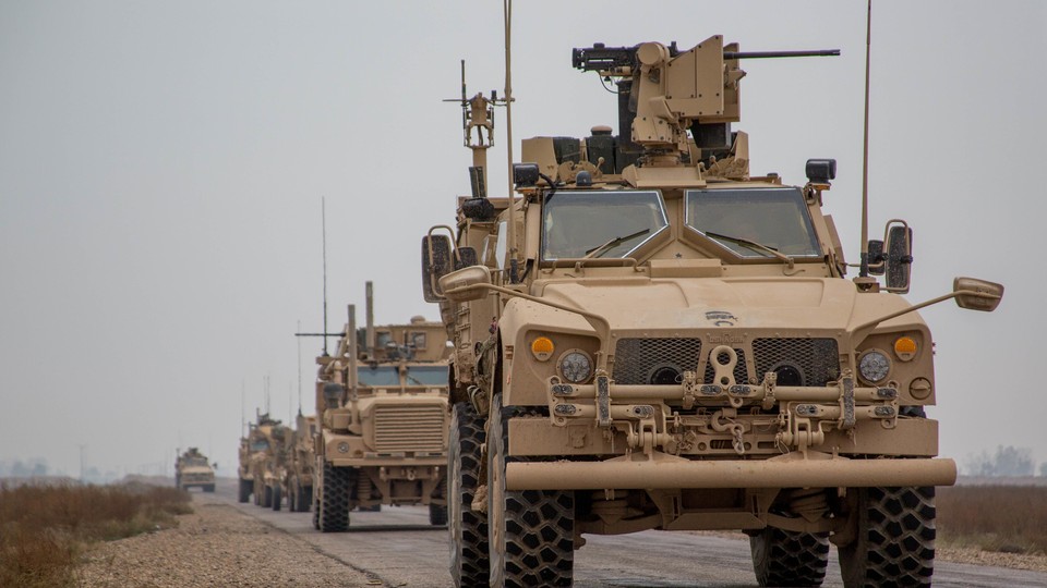 A convoy from the U.S. led international coalition against the Islamic State in Syria on November 22, 2018