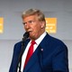 Donald Trump looks to the side while speaking at the Economic Club of New York